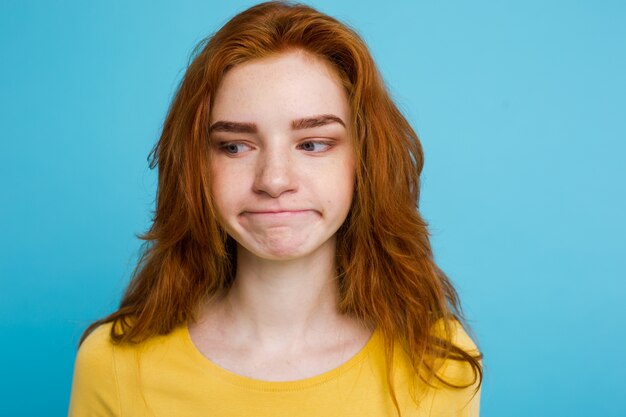 Free Photo Headshot Portrait Of Tender Redhead Teenage Girl With Serious Expression Looking At