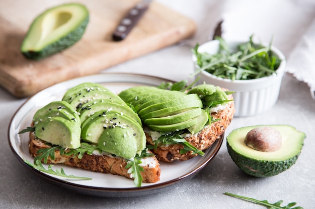 Premium Photo | Healthy breakfast with avocado and delicious wholewheat ...