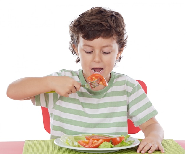 Premium Photo | Healthy child eating balanced diet a over withe background