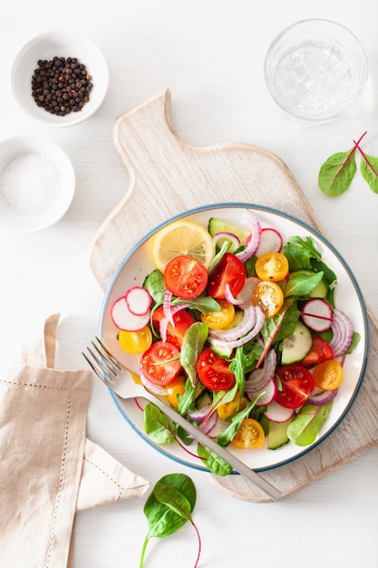 Premium Photo | Healthy colorful vegan tomato salad with cucumber ...