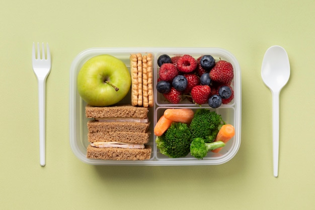 Free Photo | Healthy food box arrangement top view