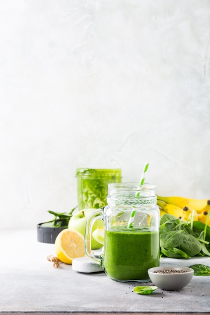 Premium Photo | Healthy green smoothie with spinach in ...