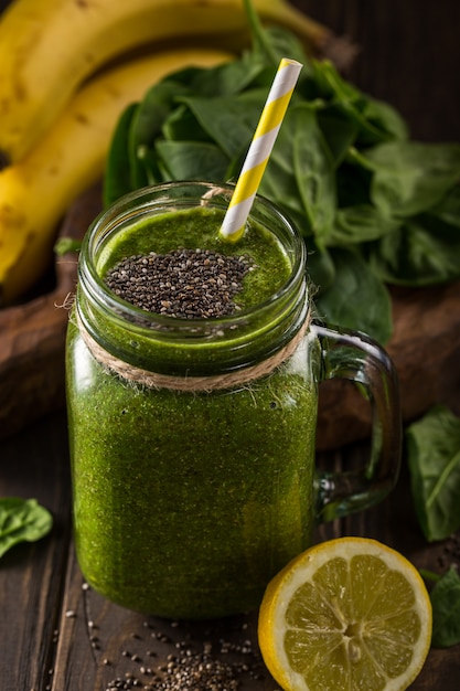 Premium Photo | Healthy green smoothie with spinach in ...