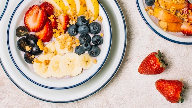 Healthy oatmeal with fruits recipe Free Photo