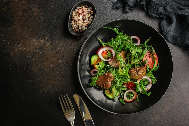 Healthy salad with liver (tasty appetizer) menu food top view Premium Photo