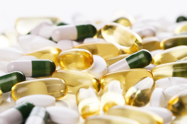 Heap of pills on the table Free Photo