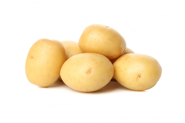 Premium Photo | Heap of young potato isolated on white surface