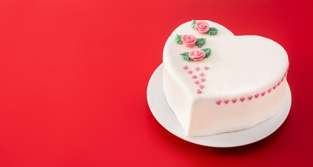 Premium Photo Heart Cake For St Valentine S Day Mother S Day Or Birthday Decorated With Roses And Pink Sugar Hearts On Red Background