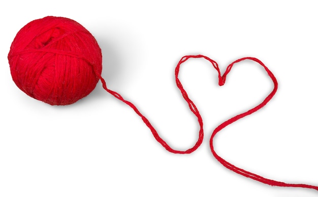 Premium Photo | Heart-shape made of yarn