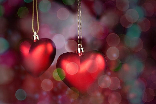 Hearts hanging from a rope with background out of focus Photo | Free ...