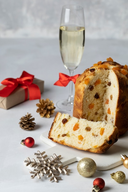 Free Photo | High angle christmas panettone and present