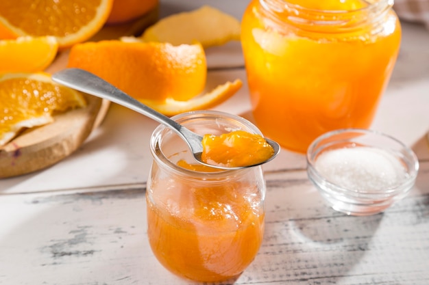 Download Free Photo High Angle Of Clear Jar With Orange Jam Yellowimages Mockups