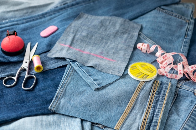 Free Photo | High angle jeans pieces and scissors