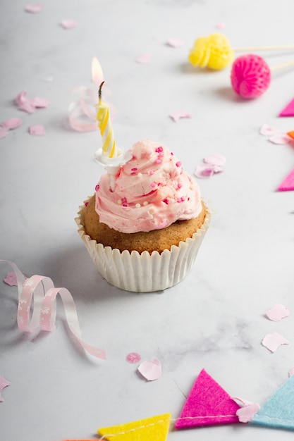 Free Photo | High angle of lit candle in birthday cupcake