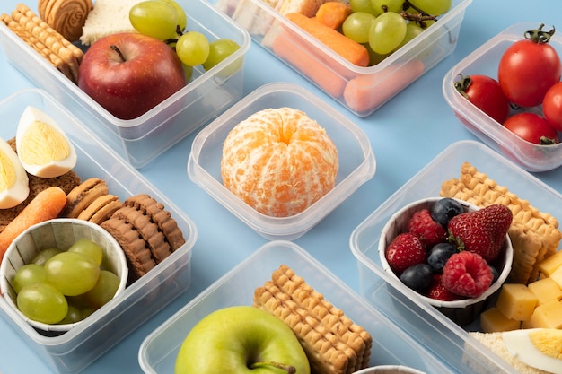 Premium Photo | High angle lunch boxes assortment