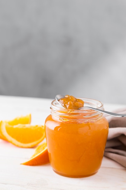 Download Free Photo High Angle Of Orange Jam In Glass Jar Yellowimages Mockups