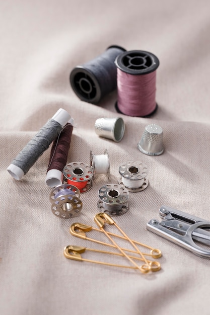Free Photo | High angle of sewing machine shuttles with thread reels ...