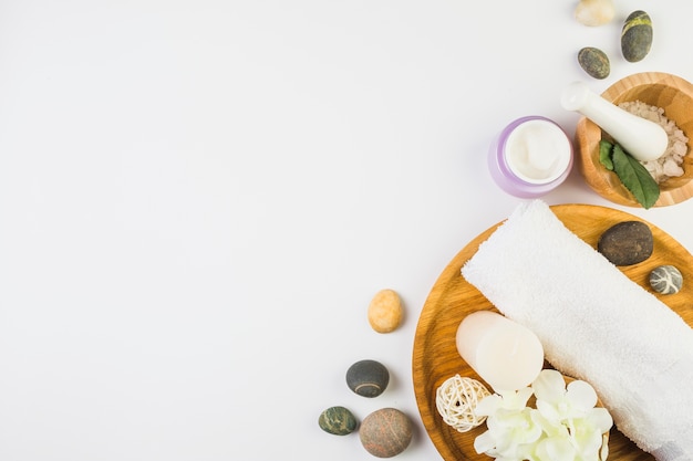 High angle view of various spa products on white backdrop Free Photo