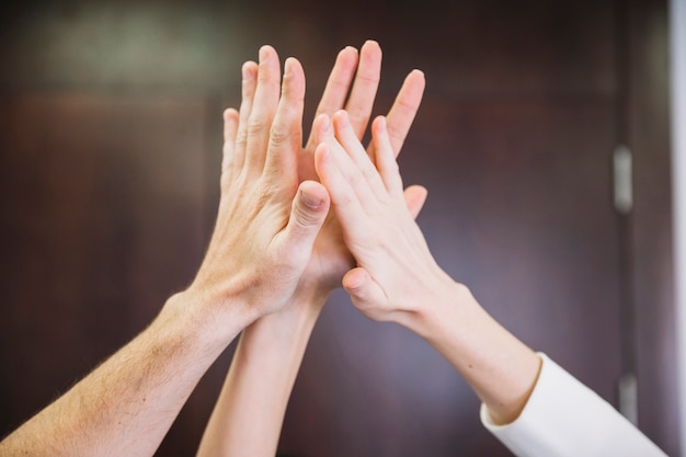 high-five-between-business-people-photo-free-download