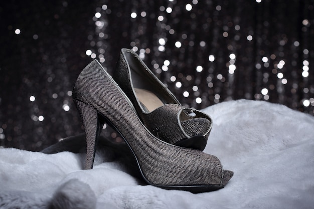 Premium Photo | High heels shoes on fur 