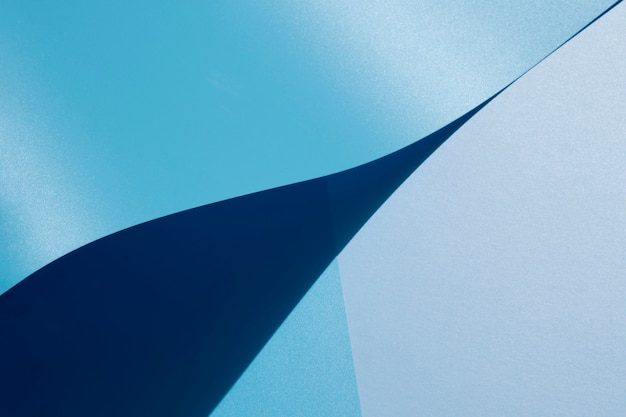 Free Photo | High view of blue curved sheets of paper