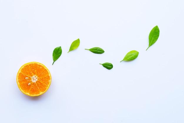 High vitamin c. fresh orange citrus fruit with leaves isolated on white. | Premium Photo