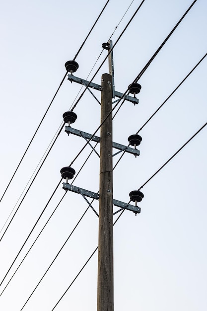 Premium Photo | High voltage electricity pole under the foggy sky close ...