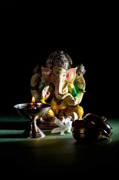 Premium Photo | Hindu god ganesha. ganesha idol. a colorful statue of ...