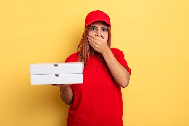 Premium Photo Hispanic Woman Covering Mouth With Hands With A Shocked Take Away Deliver Concept 2764