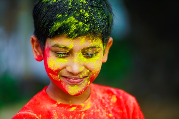 Premium Photo | Holi celebrations -indian little boy playing holi and