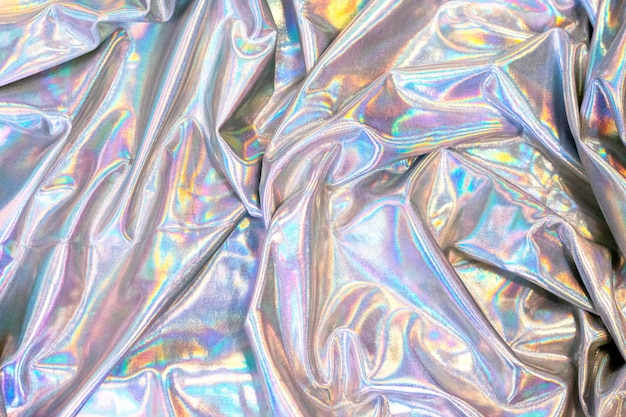 Premium Photo | Holographic texture background reflective fabric ...