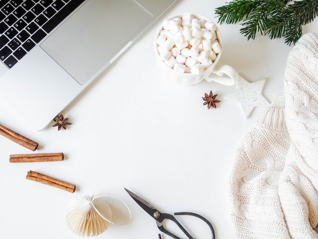 Home Office Desk With Christmas Decorations Cup With Hot Drink