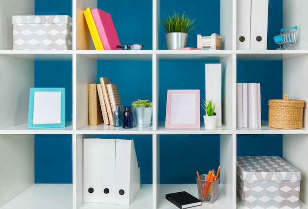 Premium Photo | Home office working space. white shelf with accessories