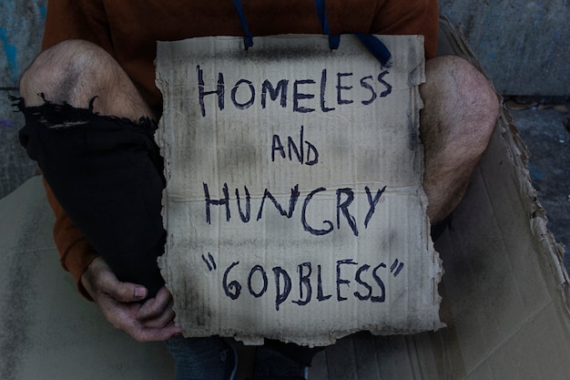 Free Photo Homeless And Hungry God Bless Sign