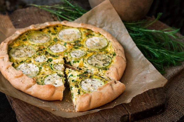 Premium Photo | Homemade courgette and goat cheese pie