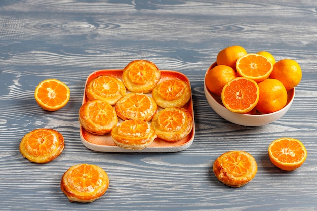 Free Photo | Homemade puff pastry with tangerine slices.