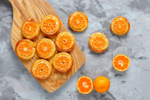 Free Photo | Homemade puff pastry with tangerine slices.