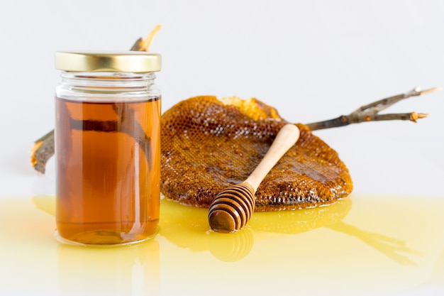 Honey with honeycomb Premium Photo