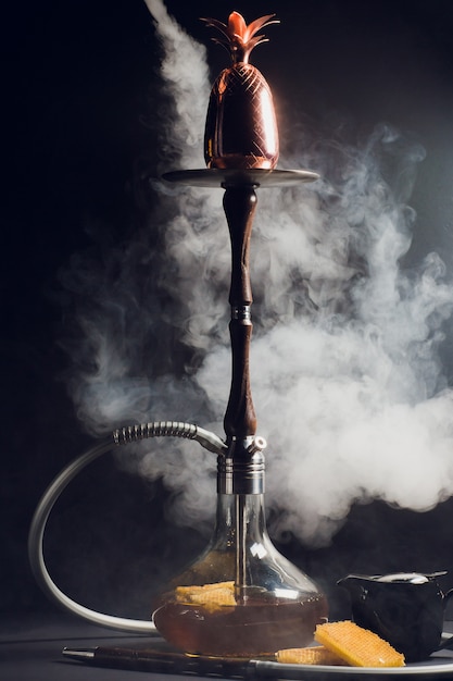 Premium Photo | A hookah with a honey base, a sweet taste of hookah ...