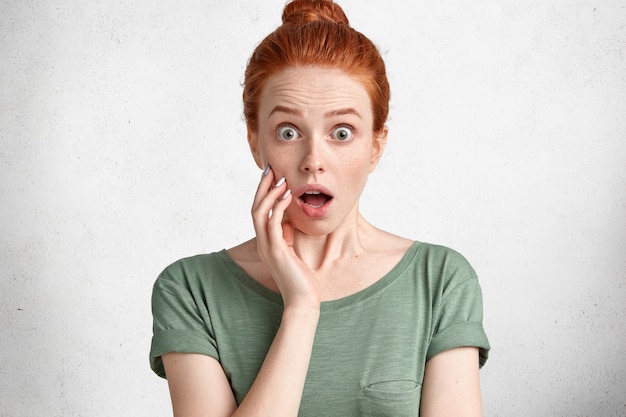 Free Photo | Horizontal portrait of shocked amazed ginger young female ...