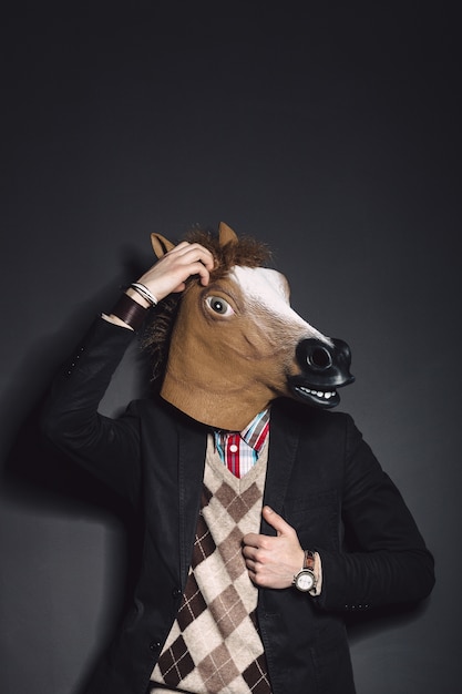Free Photo | Horse mask man in studio