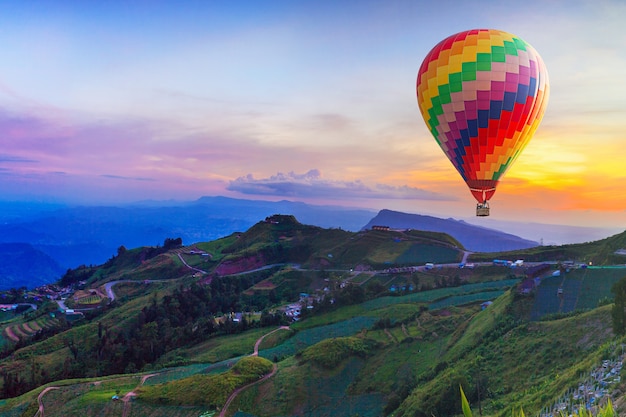 Premium Photo | Hot air balloon on beautiful mountain