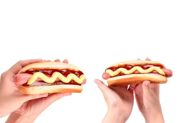 Premium Photo | Hot dog in woman hand isolated on white background ...