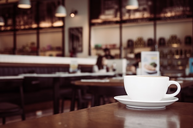 Premium Photo Hot Latte Coffee In White Cup On Table In Restaurant