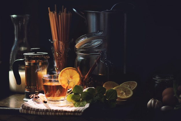 Premium Photo | Hot lemon herbal tea with vapor and steam in the ...