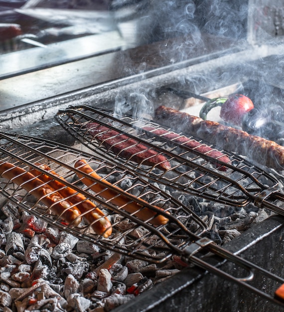 Hot sausage barbecue at open air Free Photo