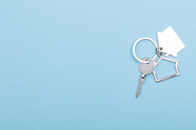 Download Free House Keys With Trinket Keychain House Symbol On Color Blue Use our free logo maker to create a logo and build your brand. Put your logo on business cards, promotional products, or your website for brand visibility.