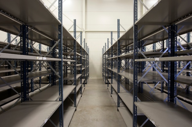 Premium Photo | Huge warehouse with empty racks inside for storage ...