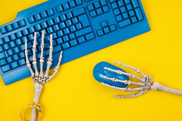 Premium Photo Human Skeleton Hands Typing On Blue Computer Keyboard