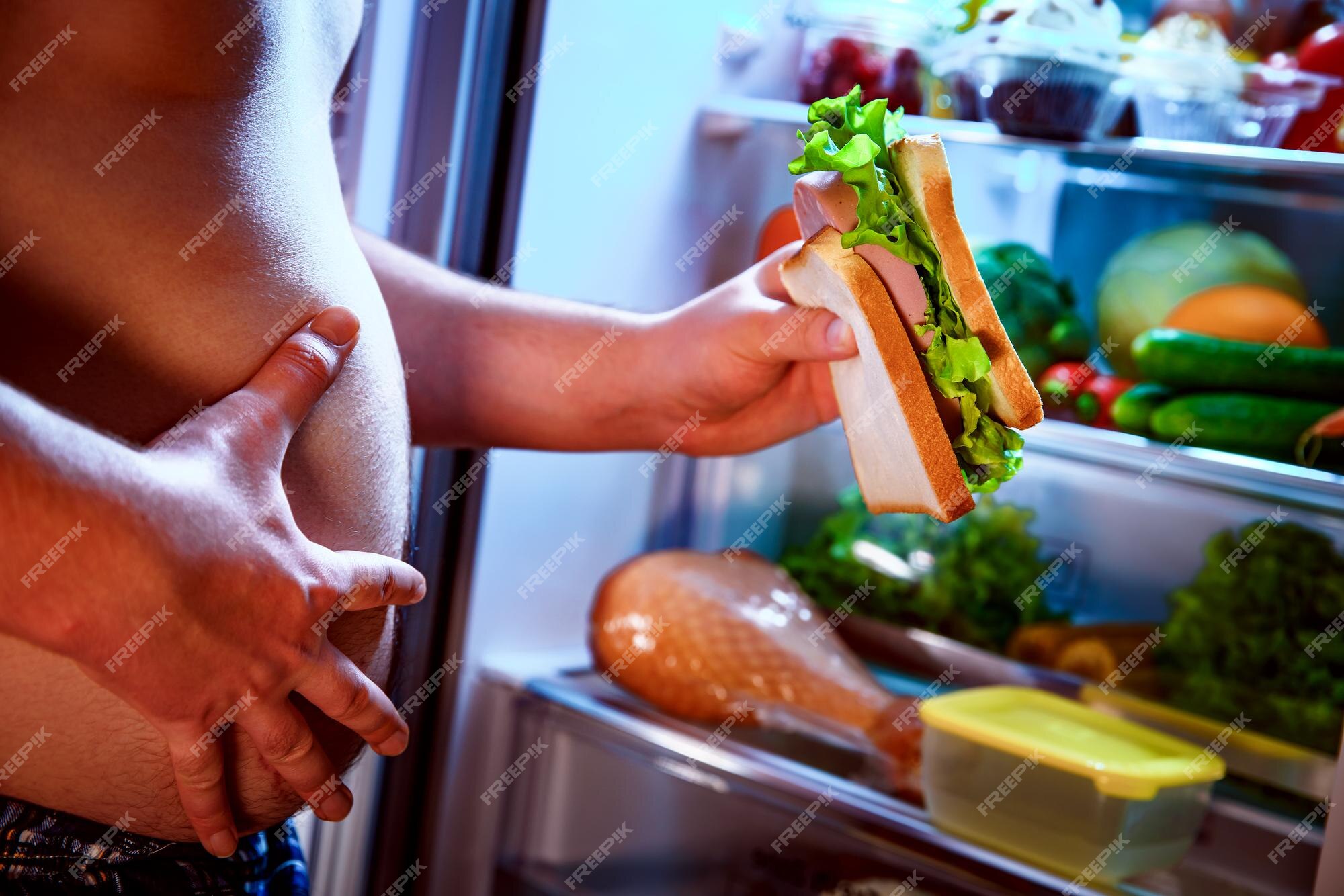 premium-photo-hungry-fat-man-holding-a-big-sandwich-in-his-hands-and